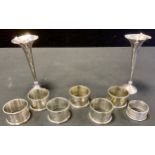 Silver & Plate - a pair of silver bud vases, Birmingham 1904; napkin ring,; set of six silver plated