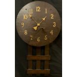 An Arts & Crafts oak cased wall clock, brass Arabic numerals, arrow hands, mechanical 8 day