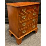 A small George III style burr walnut and walnut reproduction chest of drawers, with four graduated