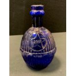 A Victorian blue glass Star Hardens Hand Grenade Fire Extinguisher. 17cm high