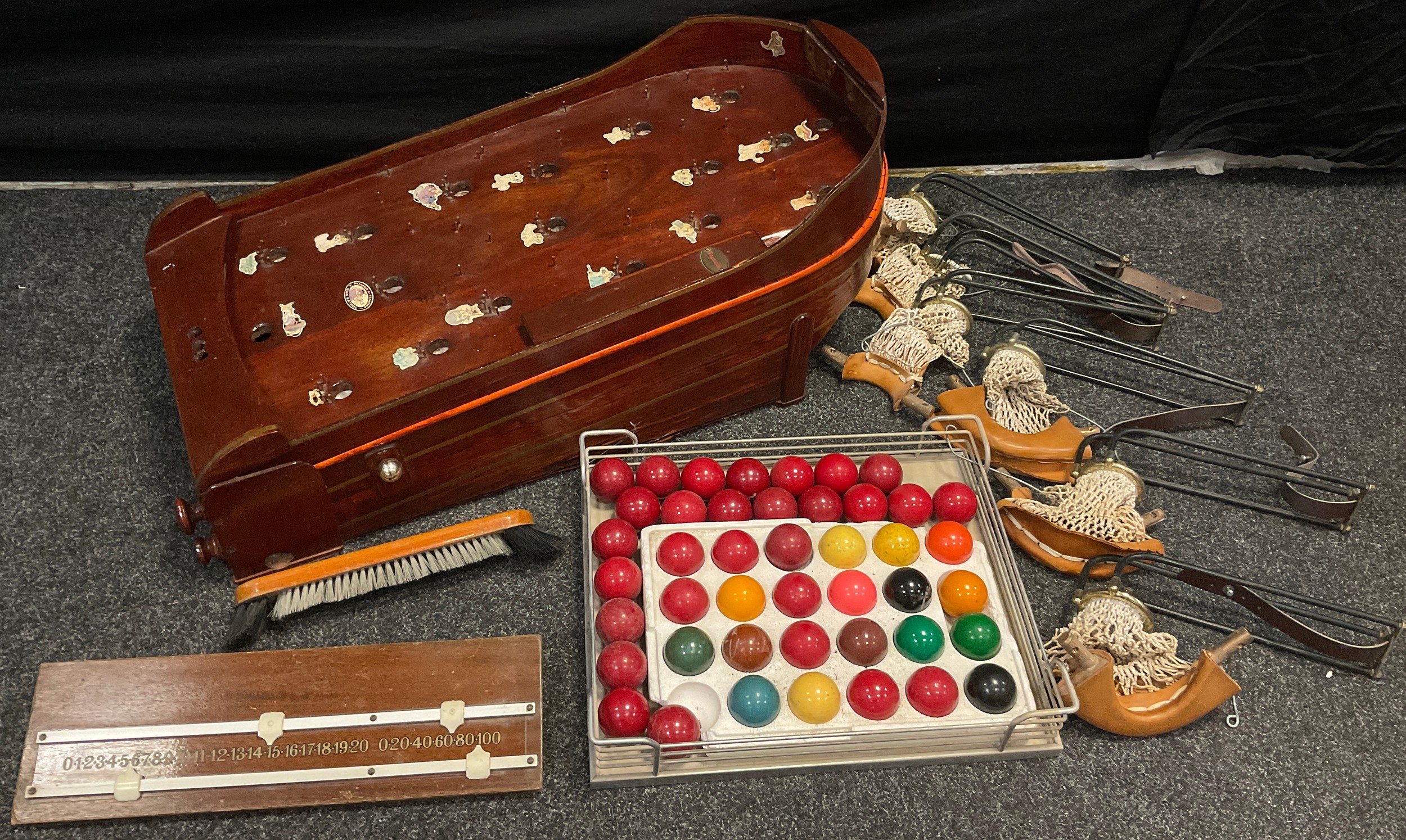 A table top Bagatelle board, 87cm x 40.5cm x 36cm high; snooker accessories - balls, table