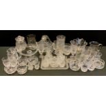 A quantity of cut glass, comprising wine glasses, fruit bowl, vase, rose bowl, decanters etc (qty)