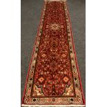 A North-west Persian Rudbar runner carpet, 354cm x 80cm.