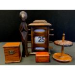 An oak desk calendar, day, date and month; Bridge cards box; carved Madonna etc