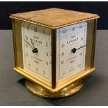A 20th century Sewill's of Liverpool brass cased desk clock/weather station with clock, barometer,