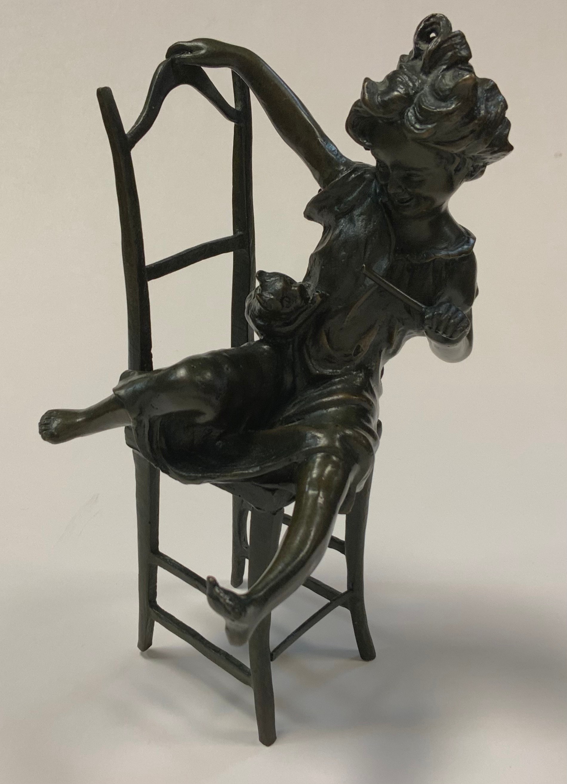 Juan Clara (Spanish, 1875-1958), after, a patinated bronze figure of a young playful girl with