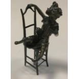 Juan Clara (Spanish, 1875-1958), after, a patinated bronze figure of a young playful girl with