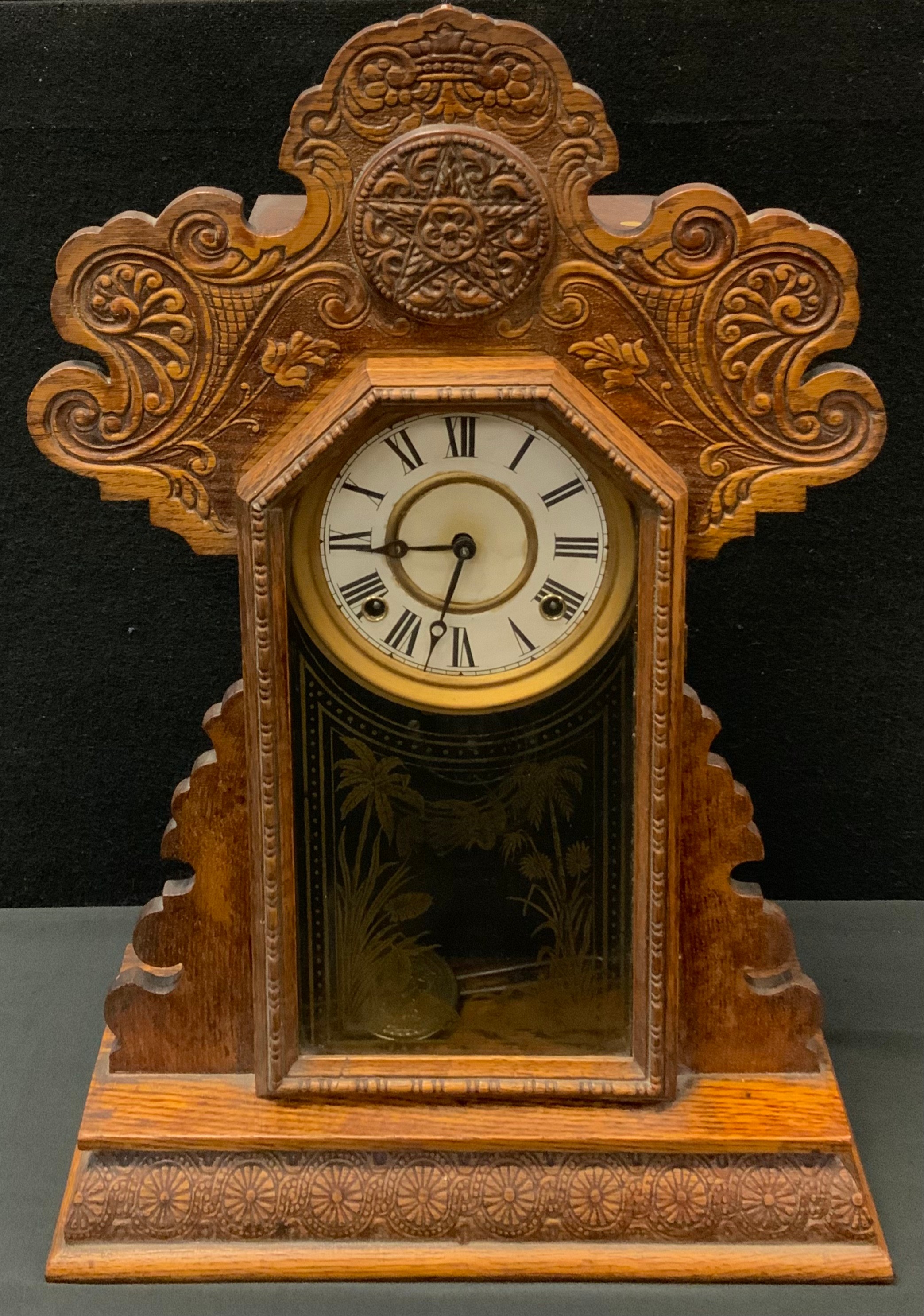 A 19th century Gingerbread clock, 56.5cm high