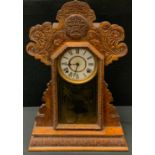 A 19th century Gingerbread clock, 56.5cm high