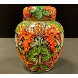 A Moorcroft Flame of the Forest ginger jar and cover, designed by Philip Gibson, tubelined and