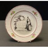 A 19th century pearlware child’s plate, commemorating the death of Queen Caroline printed in back