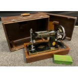 A Singer sewing machine model 223013, cased