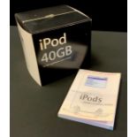 An Apple iPod 40GB, original box and packing, user manuals and accessories; The Rough Guide to iPods