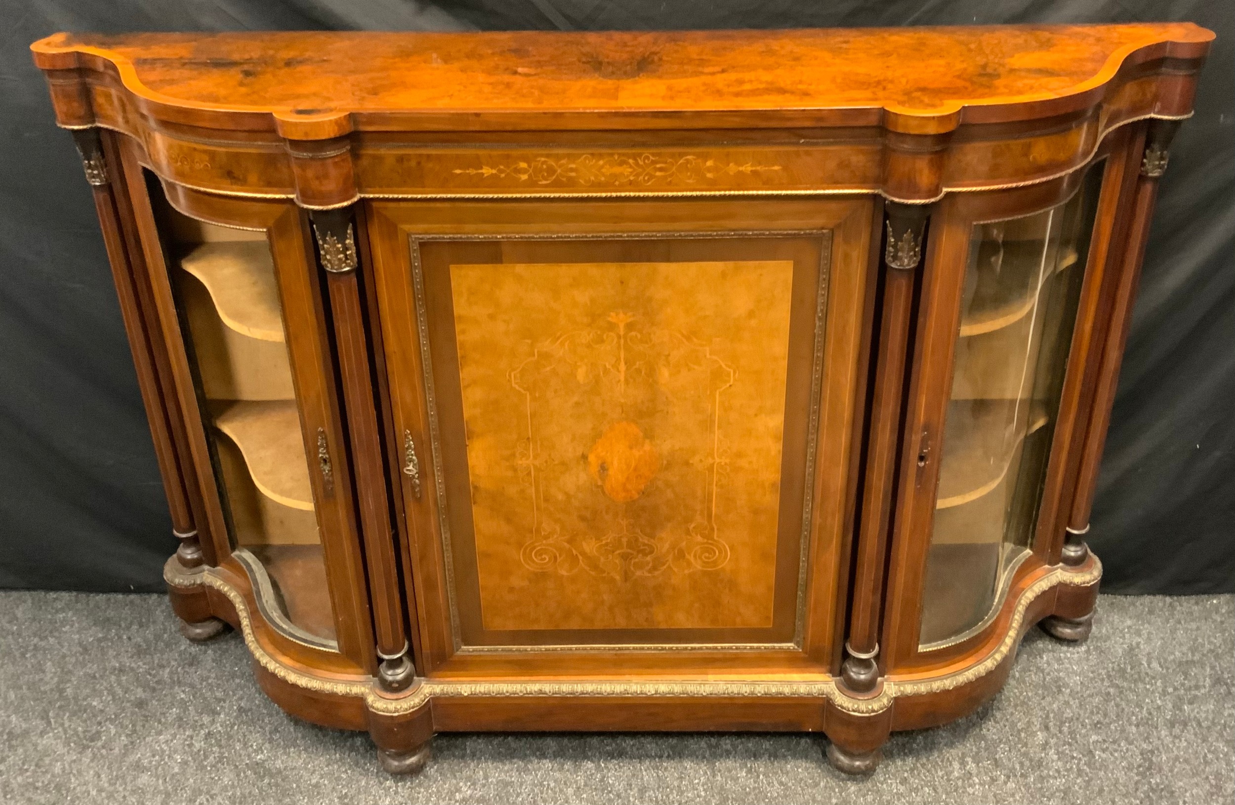 A Victorian gilt-metal mounted walnut and marquetry side cabinet, shaped serpentine moulded top