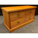 An early 20th century Pitch Pine, two short over one long, chest of drawers, 57cm high x 108.5cm