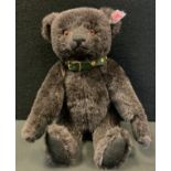 A Steiff limited edition teddy bear, black Alpaca, white ear tag, 02007, 24cm high