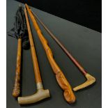 A narrow horn handle swish crop walking cane; carved bamboo handled black parasol; silver metal