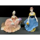 A Royal Doulton figure Reverie, Hn 2306; another Melanie, Hn 2271, both firsts (2)