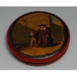 A 19th century papier mache circular snuff box, the cover transfer printed in polychrome, on a red