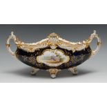 A Coalport boat-shaped vase, painted with fanciful birds within a gilt cartouche, the verso with