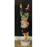 A Venetian style carved and polychrome painted softwood blackamoor torchère, marble base, 133.5cm