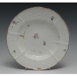 A Chelsea Gotzkowsky type shaped circular plate, moulded with flowers and painted with floral