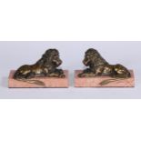 French School, 19th century, a pair of bronzes, recumbent lions, facing to dexter and sinister,