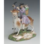 A Derby type figure, The Welch Tailor, he seated astride a goat, he wearing a tricorn hat