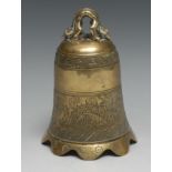 A Chinese bronze gong or bell, cast and chased with dragons, scrolls and script, 18cm high, 19th/