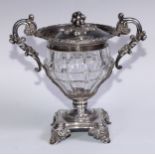 A 19th century French silver and clear glass sweetmeat urn and cover, chased with scrolling