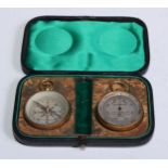 An early 20th century gilt brass travelling pocket aneroid barometer and compass, 4cm silvered