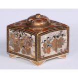 A Japanese satsuma lozenge shaped koro and cover, painted and gilt with figures and dense flowers,