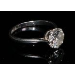 A diamond solitaire ring, 18ct white gold and platinum, the brilliant cut stone claw set, size N/