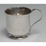 Bernard Instone - an Arts and Crafts silver and enamel mug, planished overall, the scroll handle