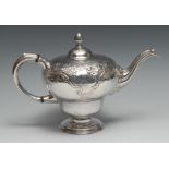 A George II Scottish silver bullet shaped teapot, chased in the Rococo taste with flowers and