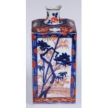 A 17th century Japanese square vase, painted in the Imari palette with ikebana, flowers and