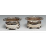 A pair of Regency Old Sheffield Plate wine coasters, acanthus borders, draught turned bases, 18cm