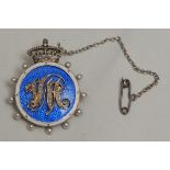 Royalty - a Victorian gold coloured metal, seed pearl and guilloche enamel brooch, presumably a