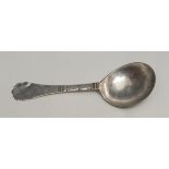 An 18th century Norwegian silver spoon, faceted stem, the terminal shaped and engraved with a