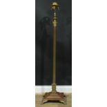 Interior Design - a brass telescopic floor lamp, Corinthian column, stepped square base, paw feet,