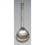 A Charles I silver seal top spoon, the bowl initialled MG to verso, 15.5cm long, five petal mark,