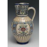 A large Zsolnay Pecs ovoid jug or ewer, decorated in polychrome in the Persian taste, 32cm high,