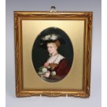 A German porcelain oval plaque, painted with a portrait of a lady, 18.5cm x 14cm, gilt frame, 29cm x