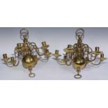 A near pair of Dutch brass six-light chandeliers, 45cm high, 46cm wide