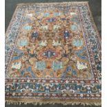 A large Caucasian wool rug or carpet, worked in the traditional manner with coloured threads,