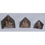 An Art Deco Egyptian Revival graduated trio of desk models, pyramids, the largest 4cm high