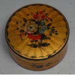 A 19th century papier mache and vernis martin circular table snuff box, push-fitting cover painted