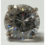 A solitaire diamond, set as an ear stud, the old round brilliant cut diamond, measuring approx 9.