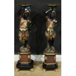 A near pair of Venetian parcel-gilt and polychrome painted blackamoor torcheres, each carved as a