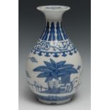 A Chinese ovoid wine vase, decorated in tones of underglaze blue with flowers and trees, bayonet